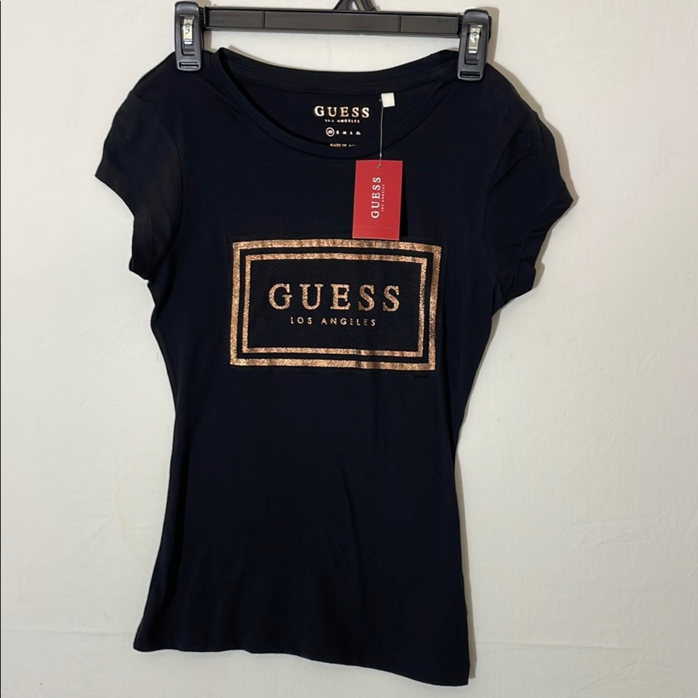Guess Tee women’s Size  XS Black and Gold Fitted Cap Sleeve (A1).✨